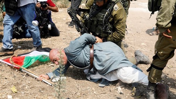 الاعتداء على فلسطيني