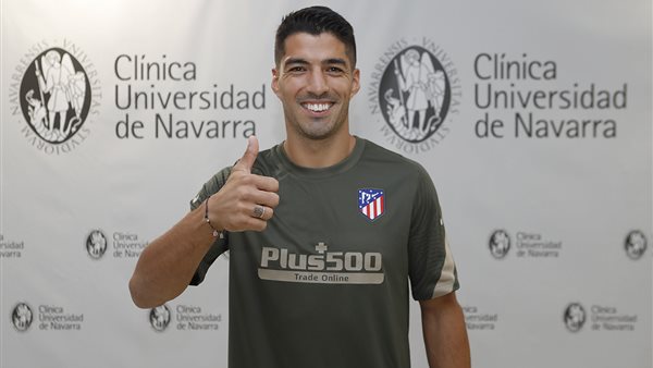 سواريز بقميص اتليتكو