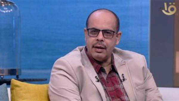 الكاتب الصحفي أكرم