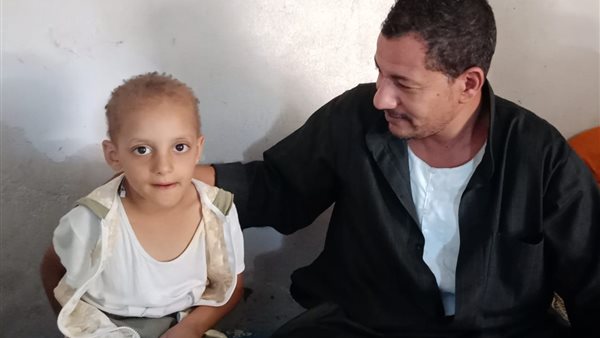 الطفلة ووالدها 