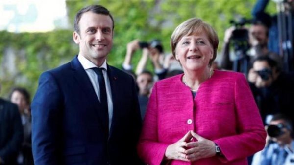 الرئيس الفرنسي والمستشارة