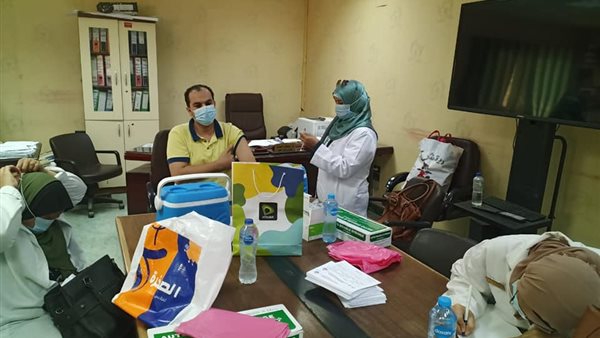 تطعيم الموظفين بلقاح