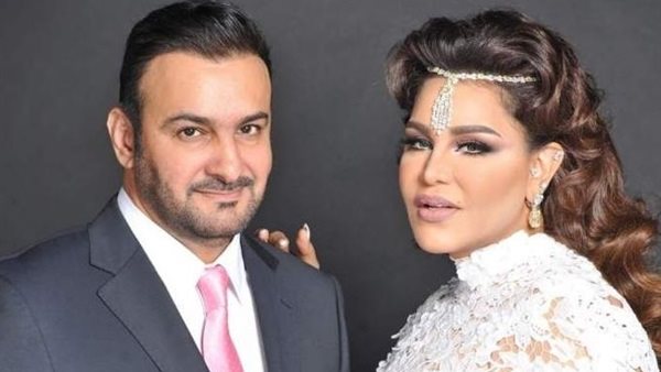 أحلام وزوجها 