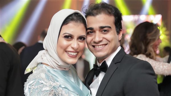 إسلام عرفات وزوجته