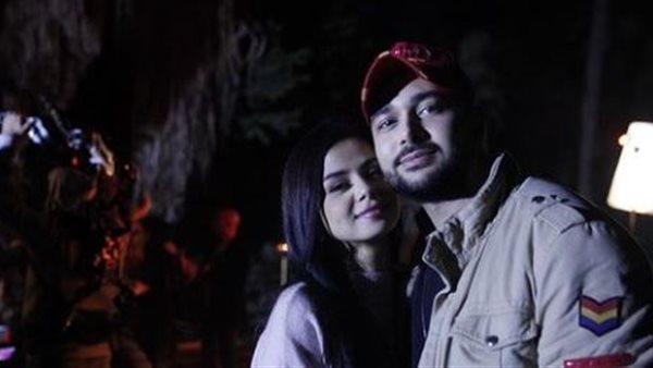 منه عرفة وزوجها