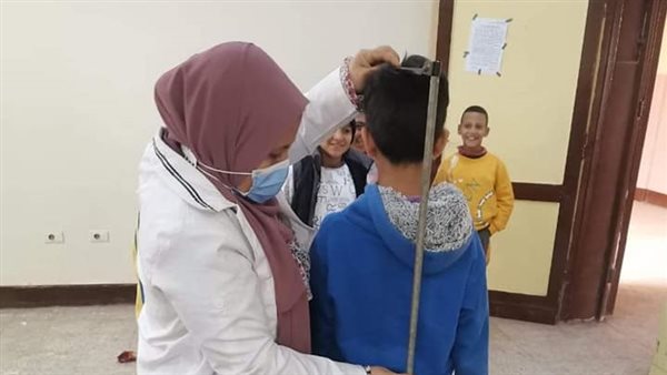 فحص طلاب المدارس