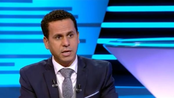 الكاتب الصحفي محمود