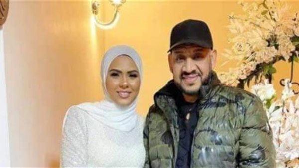 عصام كاريكا وابنته