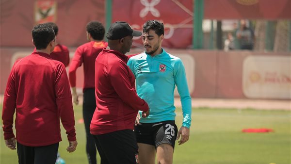 أكرم توفيق وموسيماني