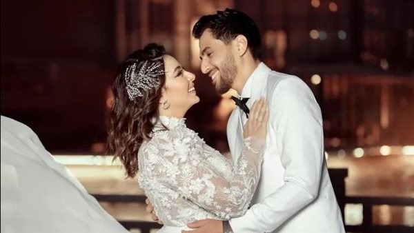 إلهام بديع وزوجها