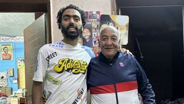 حسين الشحات وزوج