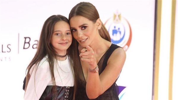 ايمان العاصي  وابنتها