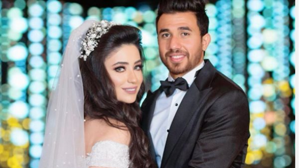 محمود تريزيجيه وزوجته