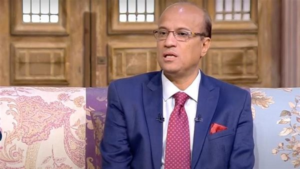 الكاتب الصحفي حسين