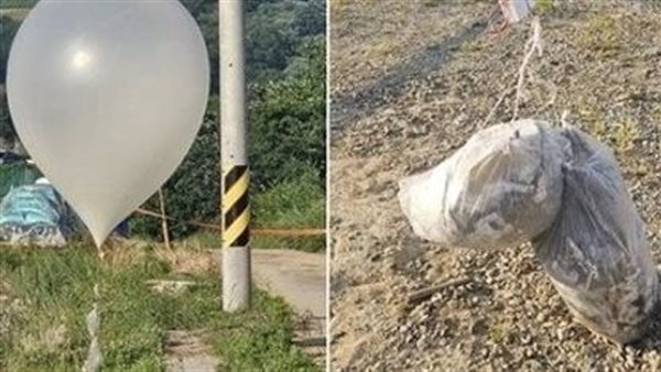 بالون يحمل القمامة