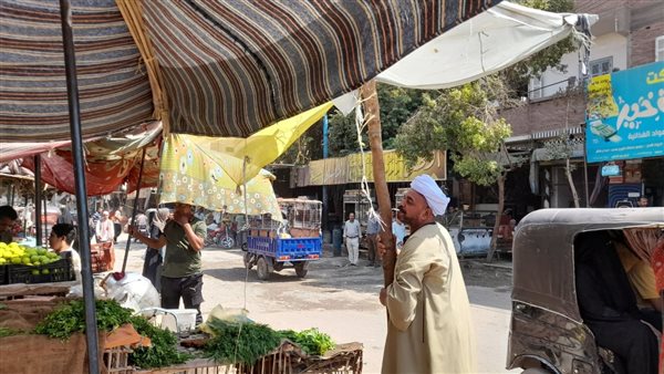 إزالة اشغالات الباعة