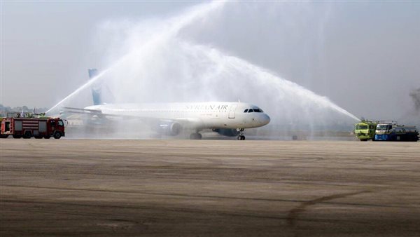 بخراطيم المياه..