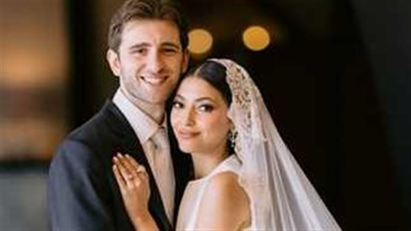 مي الغيطي وزوجها