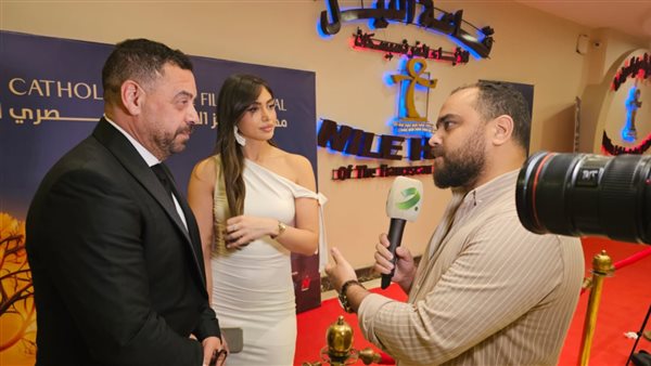 طارق العريان وزوجته