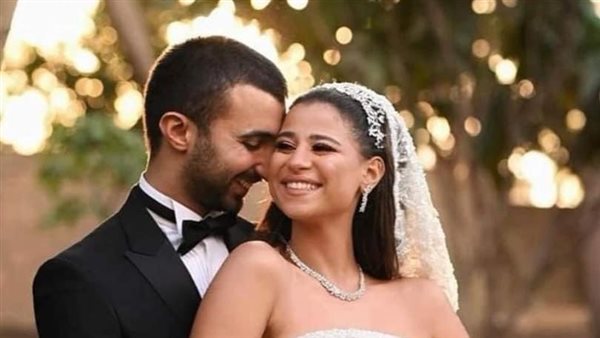 دينا داش وزوجها