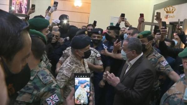 ملك الأردن ومدير