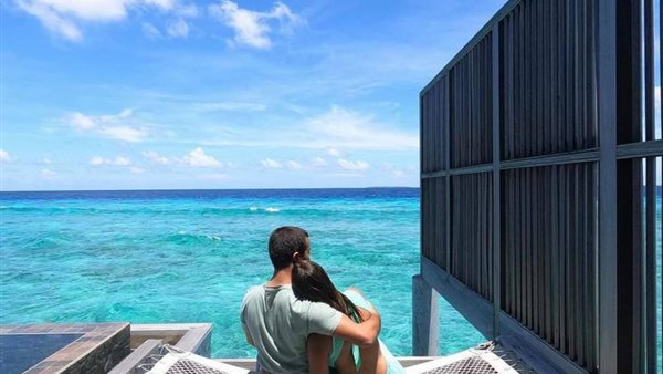 دينا داش وزوجها