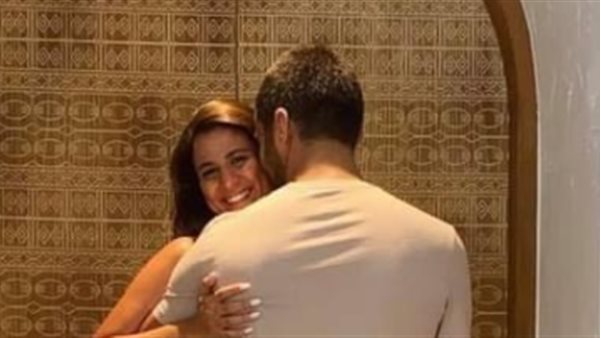 دينا داش وزوجها