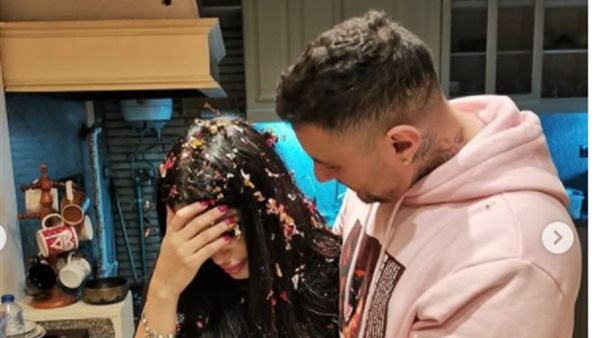 الفيشاوى وزوجته 