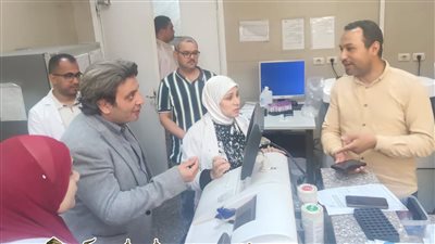 اثناء زيارة مدير فرع التأمين الصحي ببني سويف 