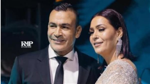 عصام الحضرى وزوجته