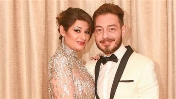 احمد زاهر وزوجته